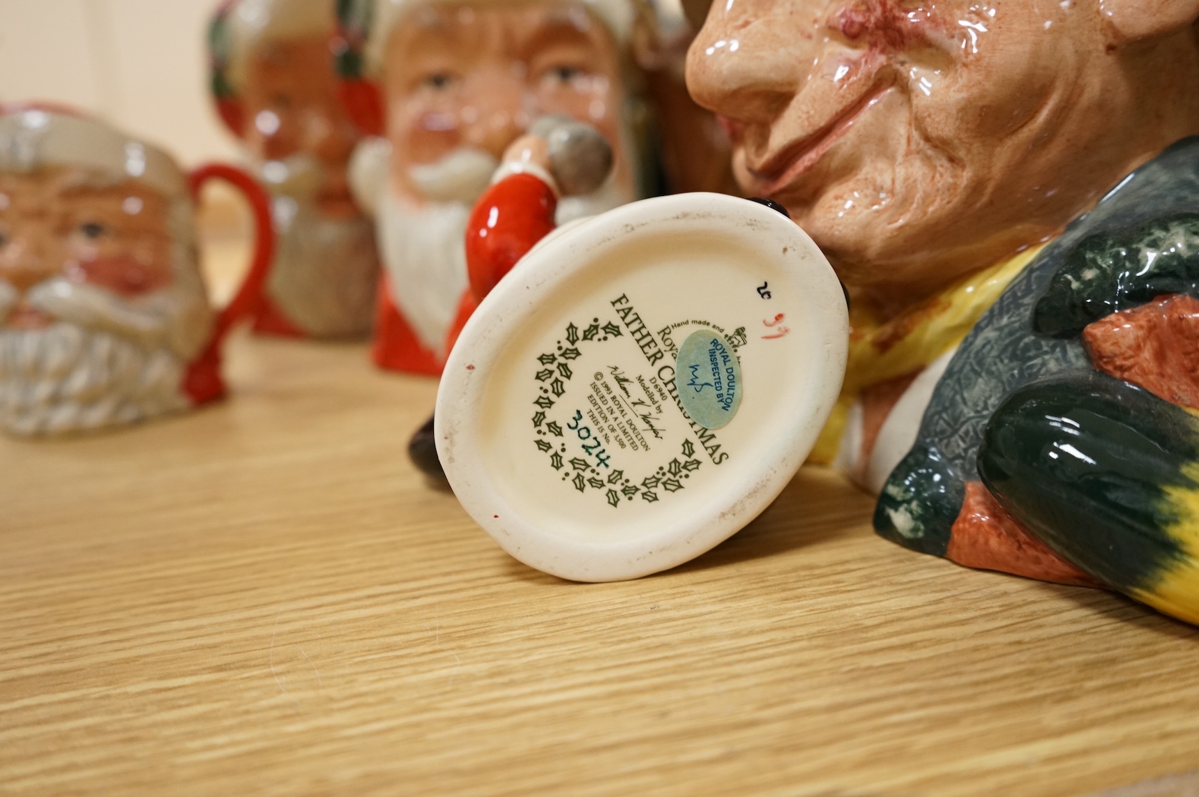 A collection of ceramics to include Doulton Toby jugs, Goebel figurines and Adderley part tea set